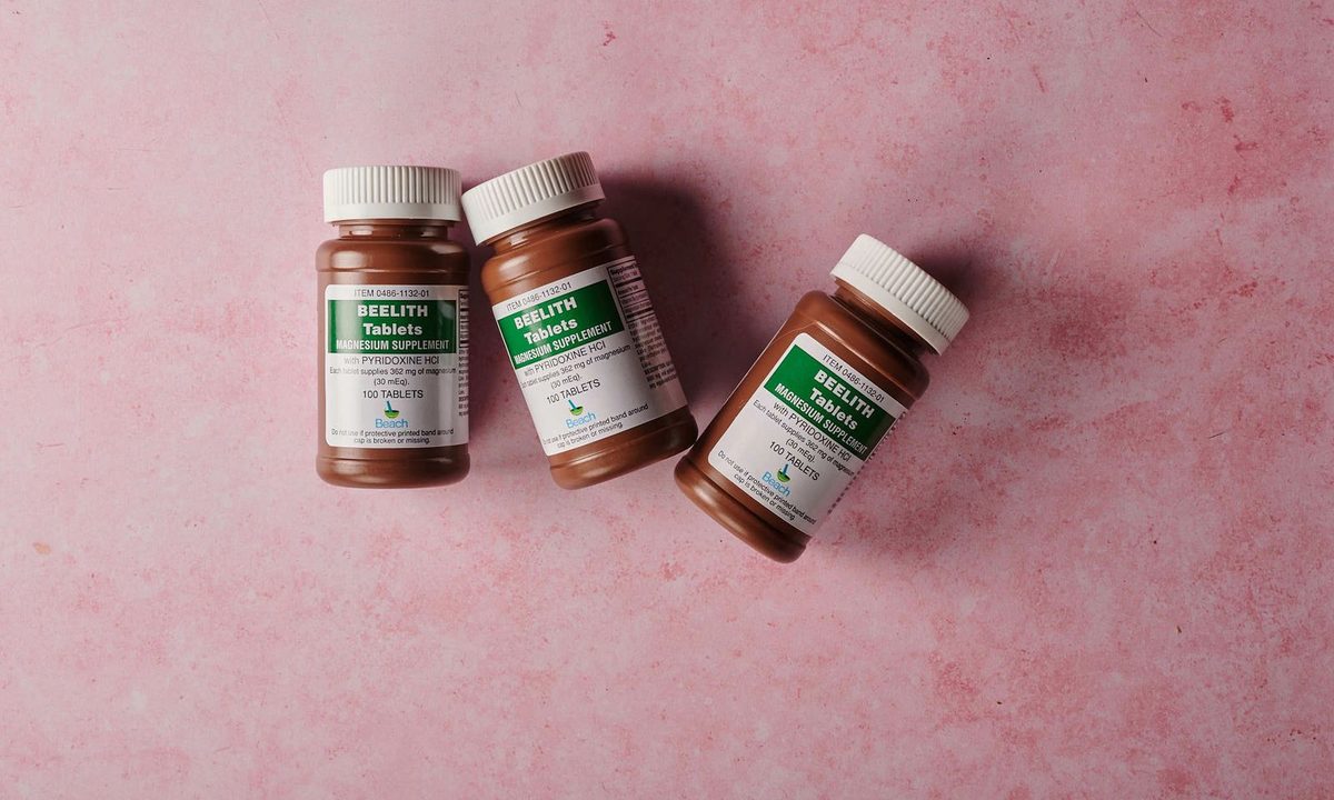 Magnesium supplement capsules on a bedside table