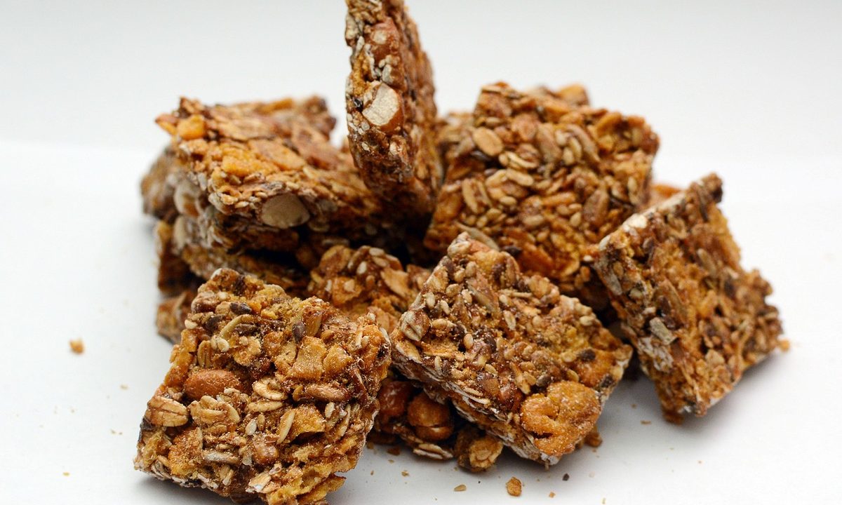 Granola breakfast bars and healthy snacks on a table