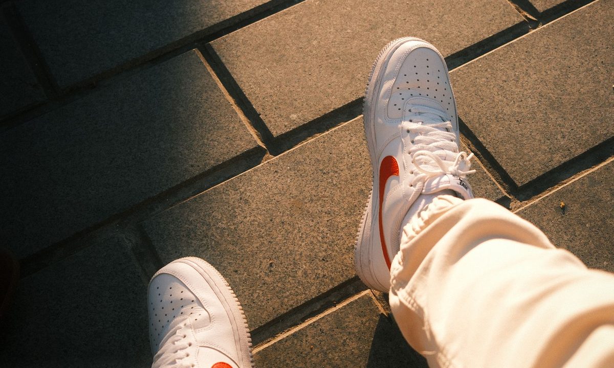 A comfortable pair of walking shoes on a light background